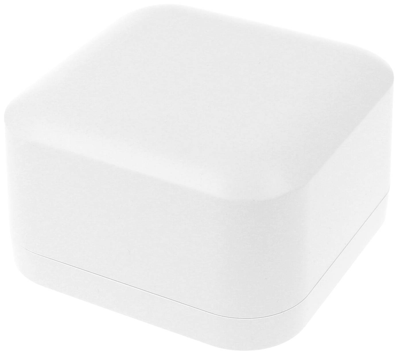 A square, white container with rounded corners, possibly a compact packaging or storage box.