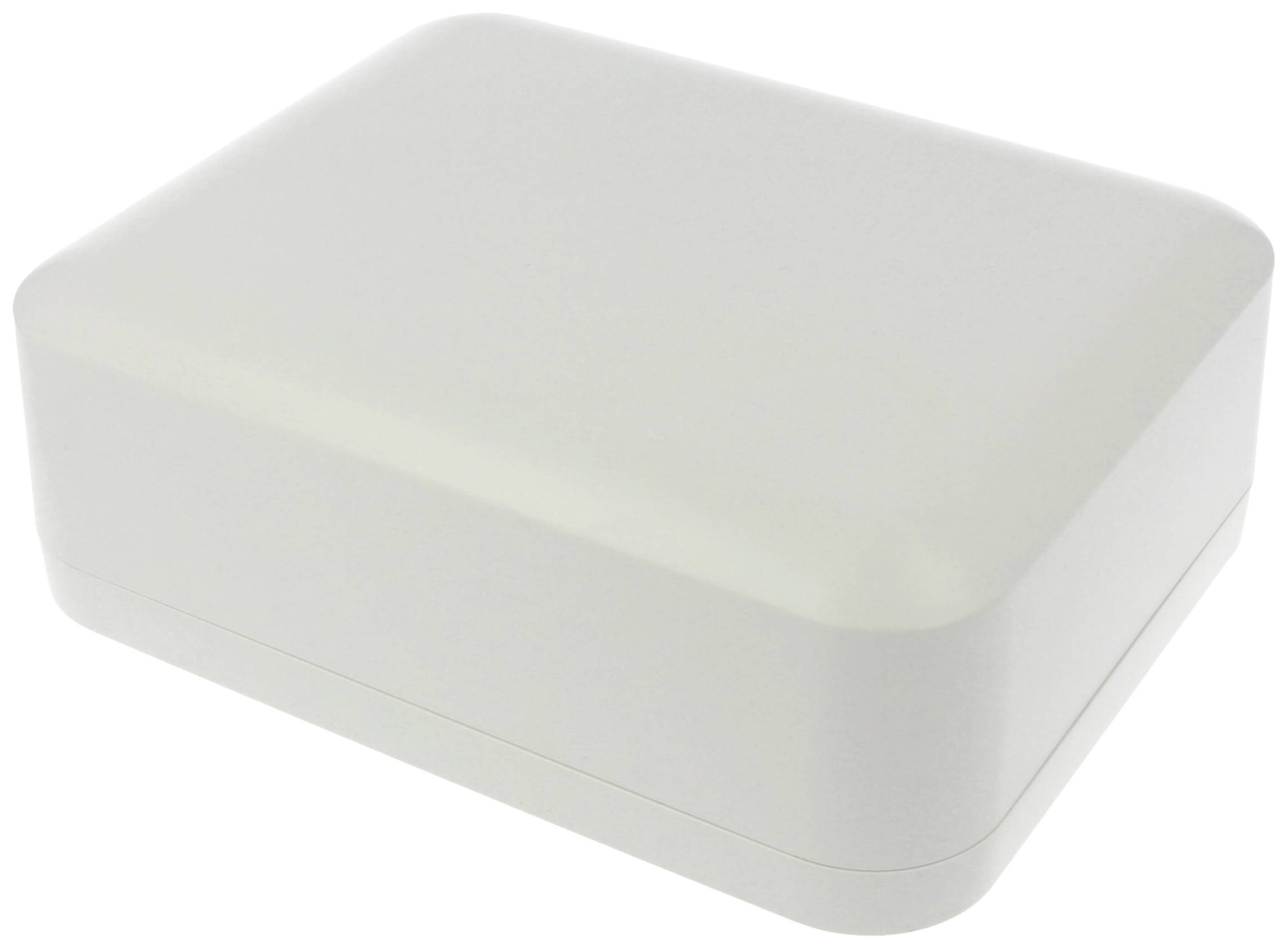 Rectangular, flat, white box with rounded corners. It is closed and has a smooth surface.