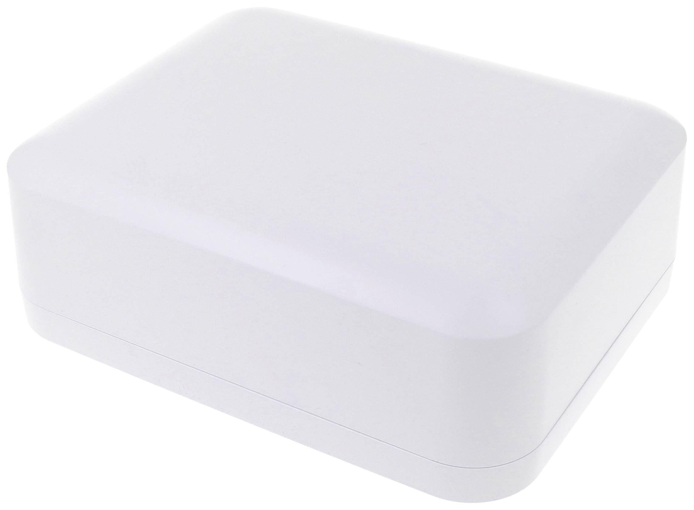 White rectangular box with rounded corners, lying on a white surface.