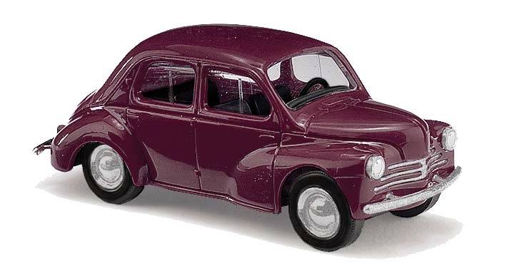 A model car in dark red, styled after a classic design with rounded forms and visible bodywork details.