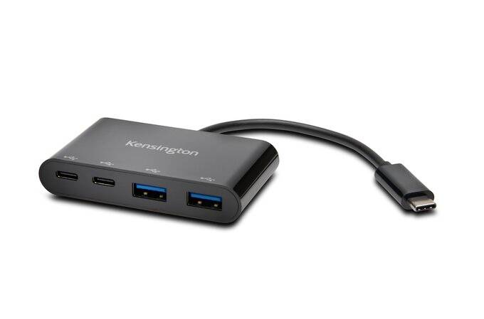 A black USB-C hub with two USB-C and two USB-A ports, connected by a short cable.