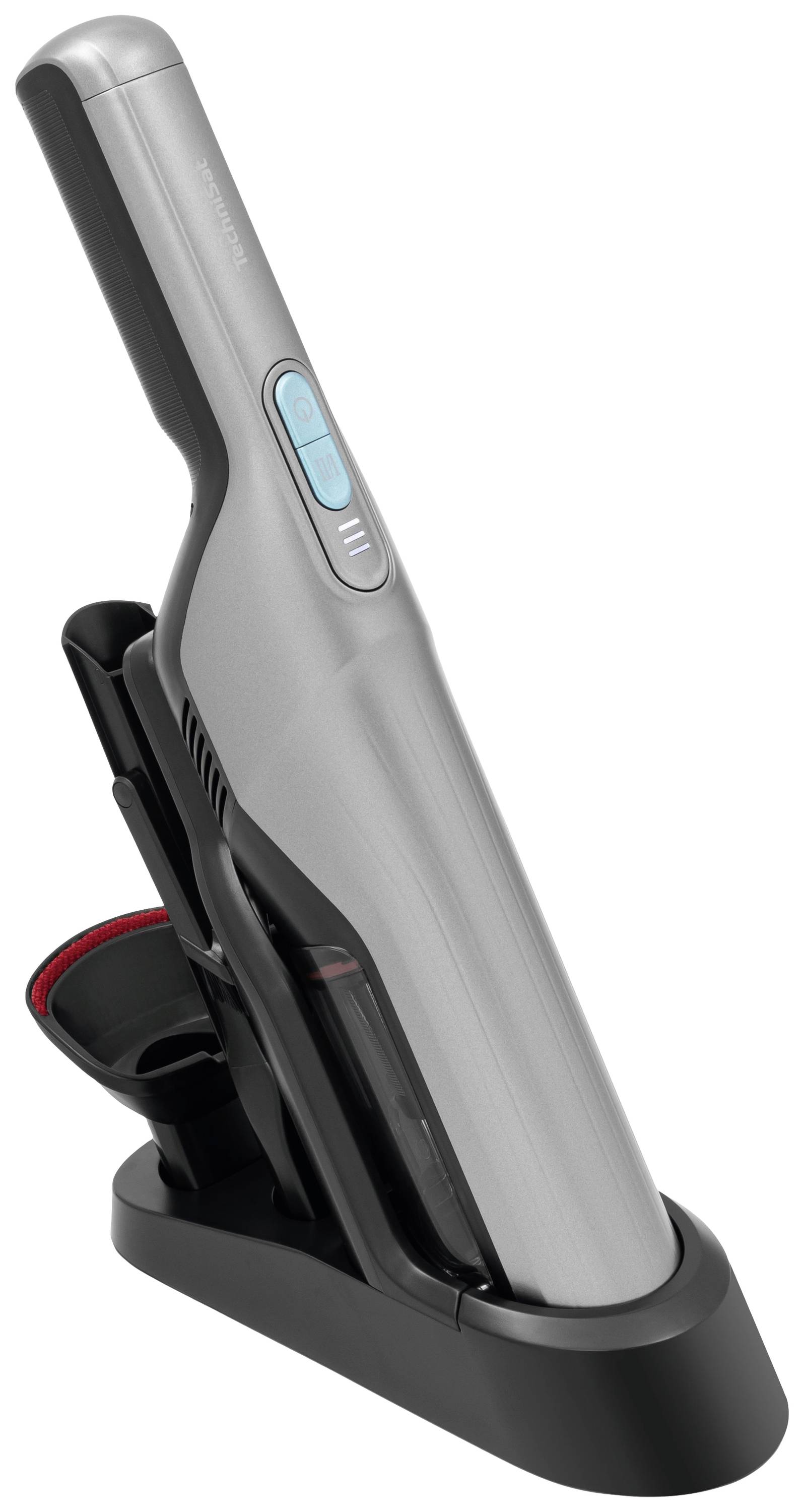 Portable, cordless handheld vacuum cleaner in silver on charging station, suitable for small cleaning tasks.