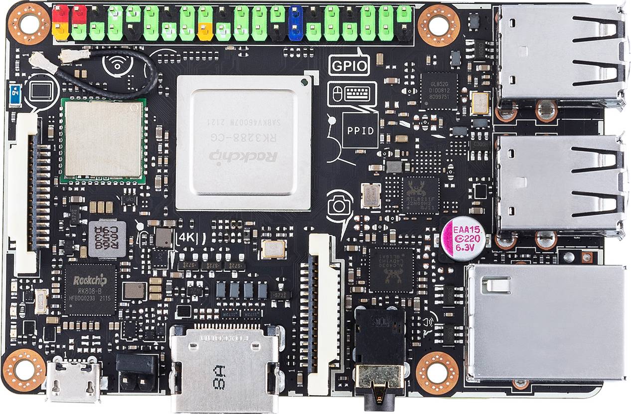 A development board with multiple USB ports, an HDMI port, and a GPIO header. The processor is positioned in the centre.