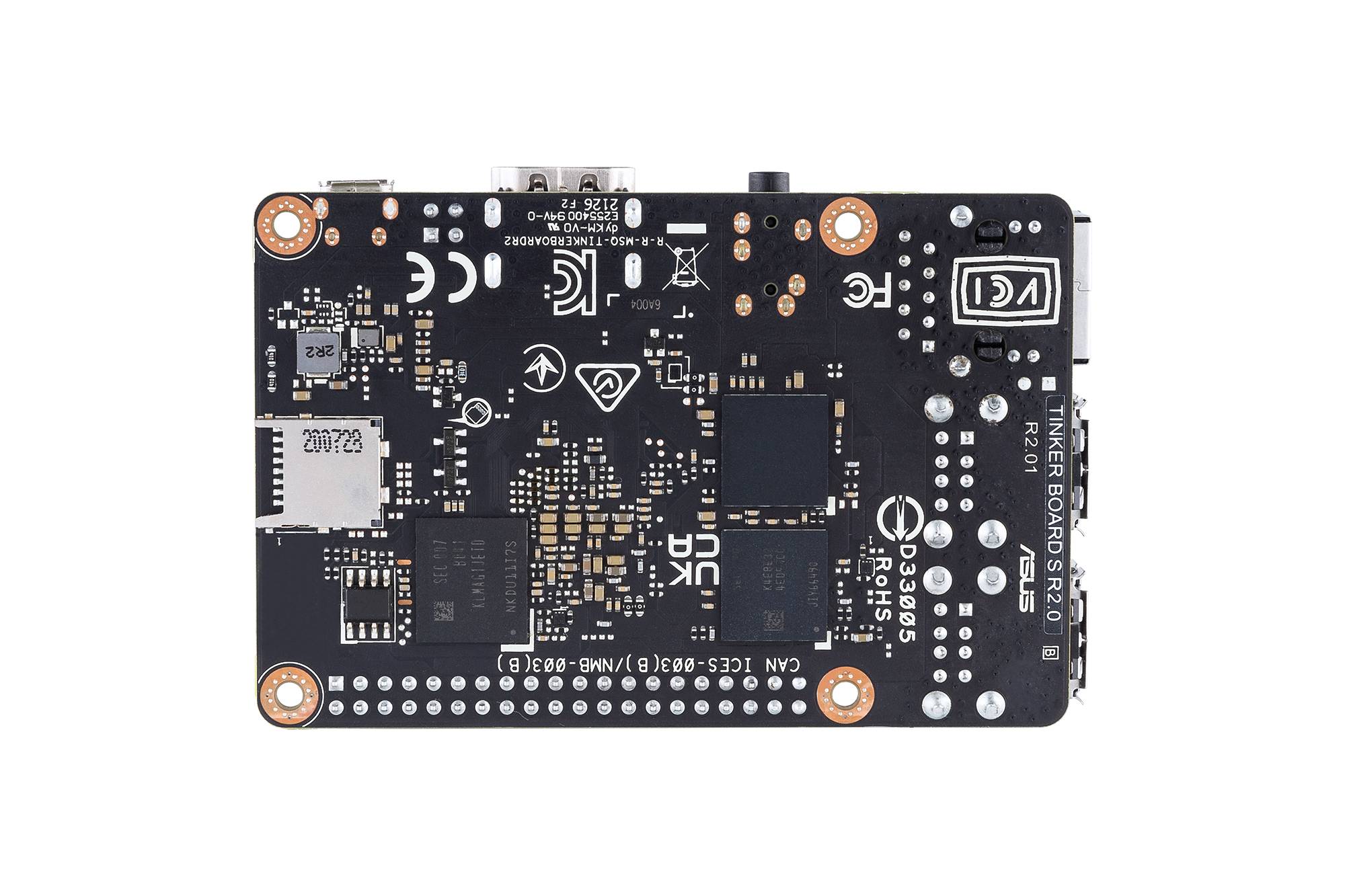 A black circuit board with electronic components and connections, including an SD card slot and various symbols and markings.