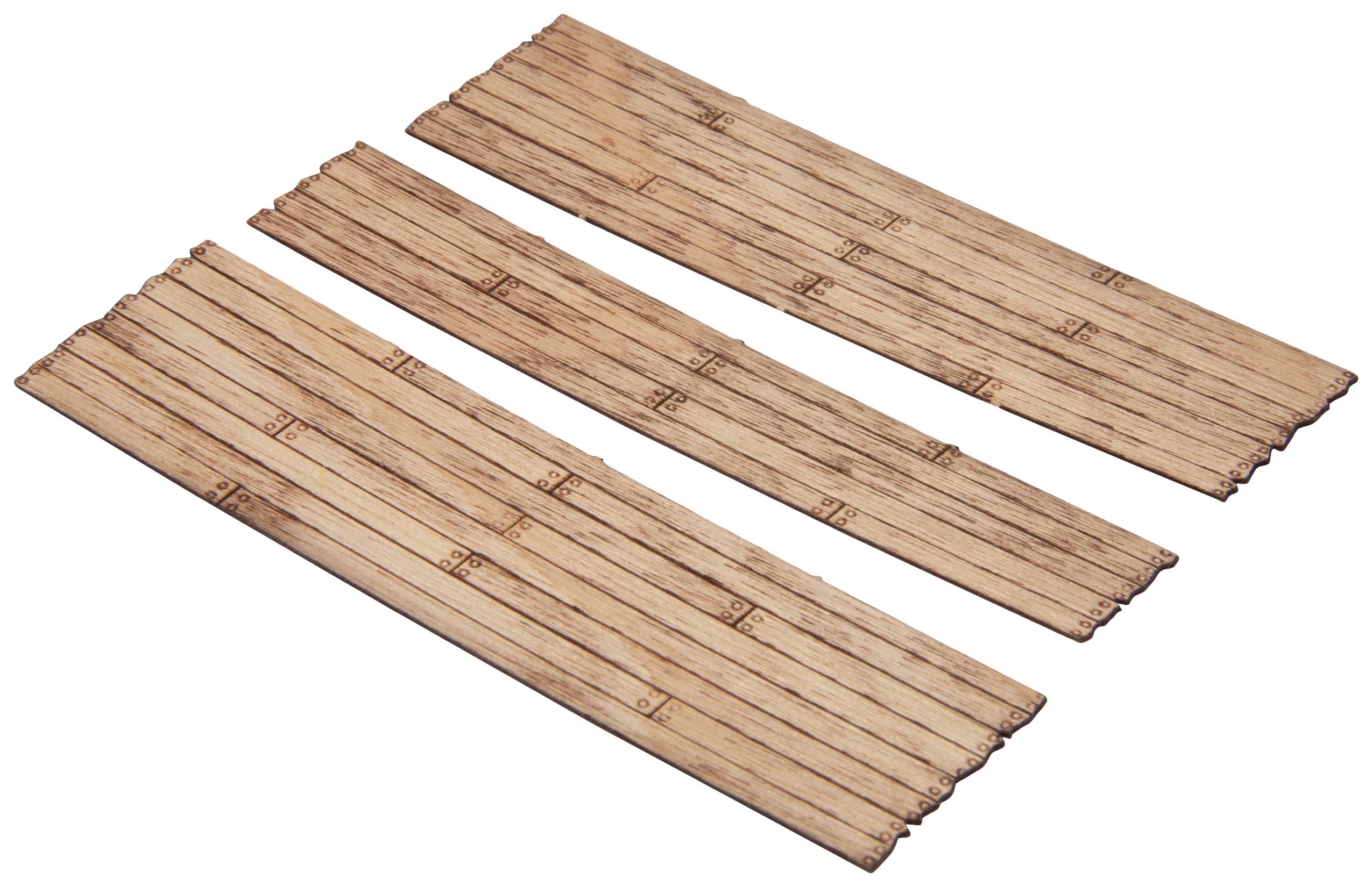 Three brown wooden sticks, each marked with notches and numbers, lie parallel to one another on a white surface.