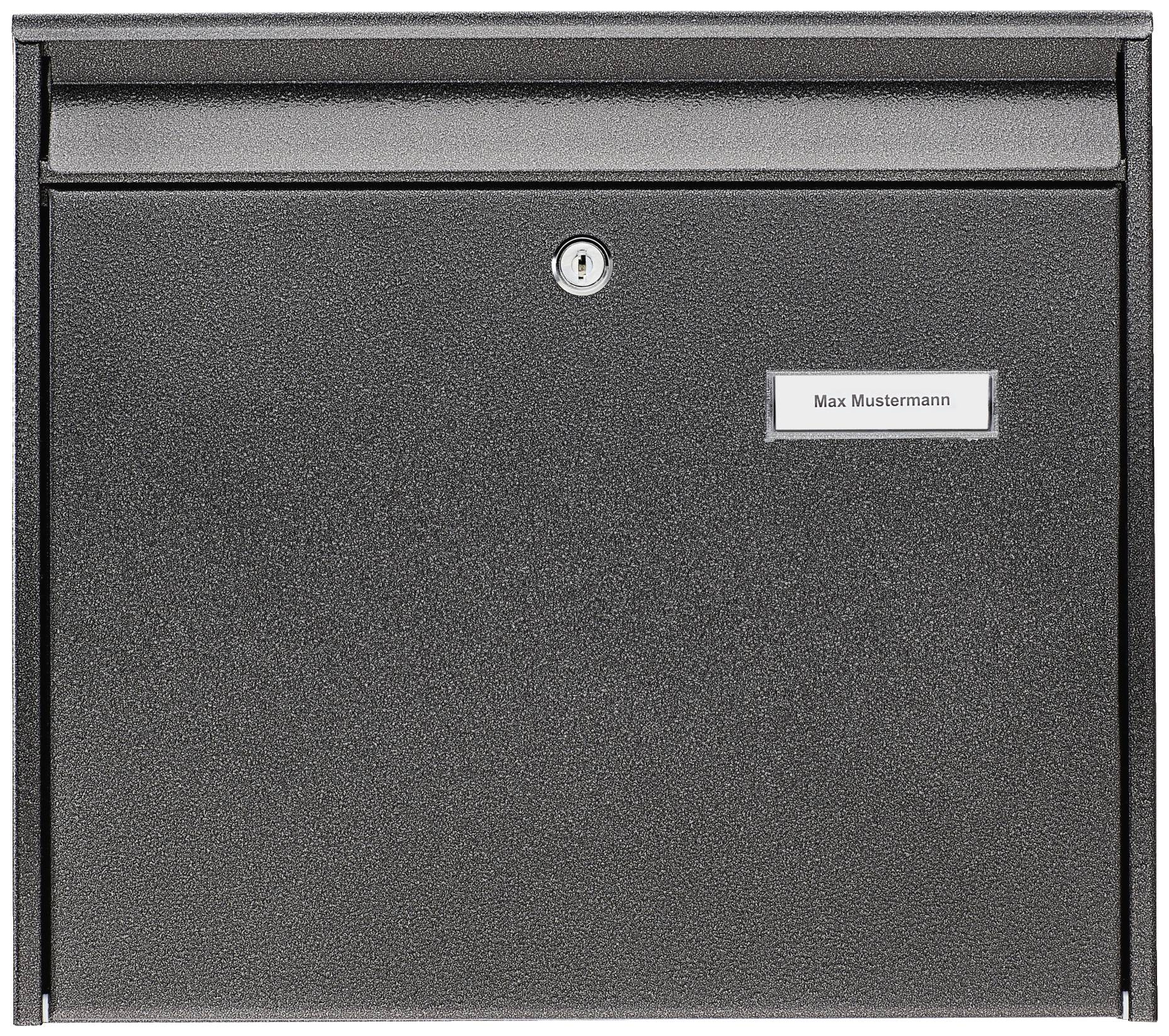 Black letterbox with a name plate. The name 'Max Mustermann' is displayed on the plate.