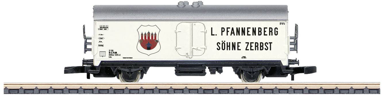 A model of a goods wagon with the inscription 'L. Pfannenberg Sons Zerbst' and a red coat of arms depicting flames.
