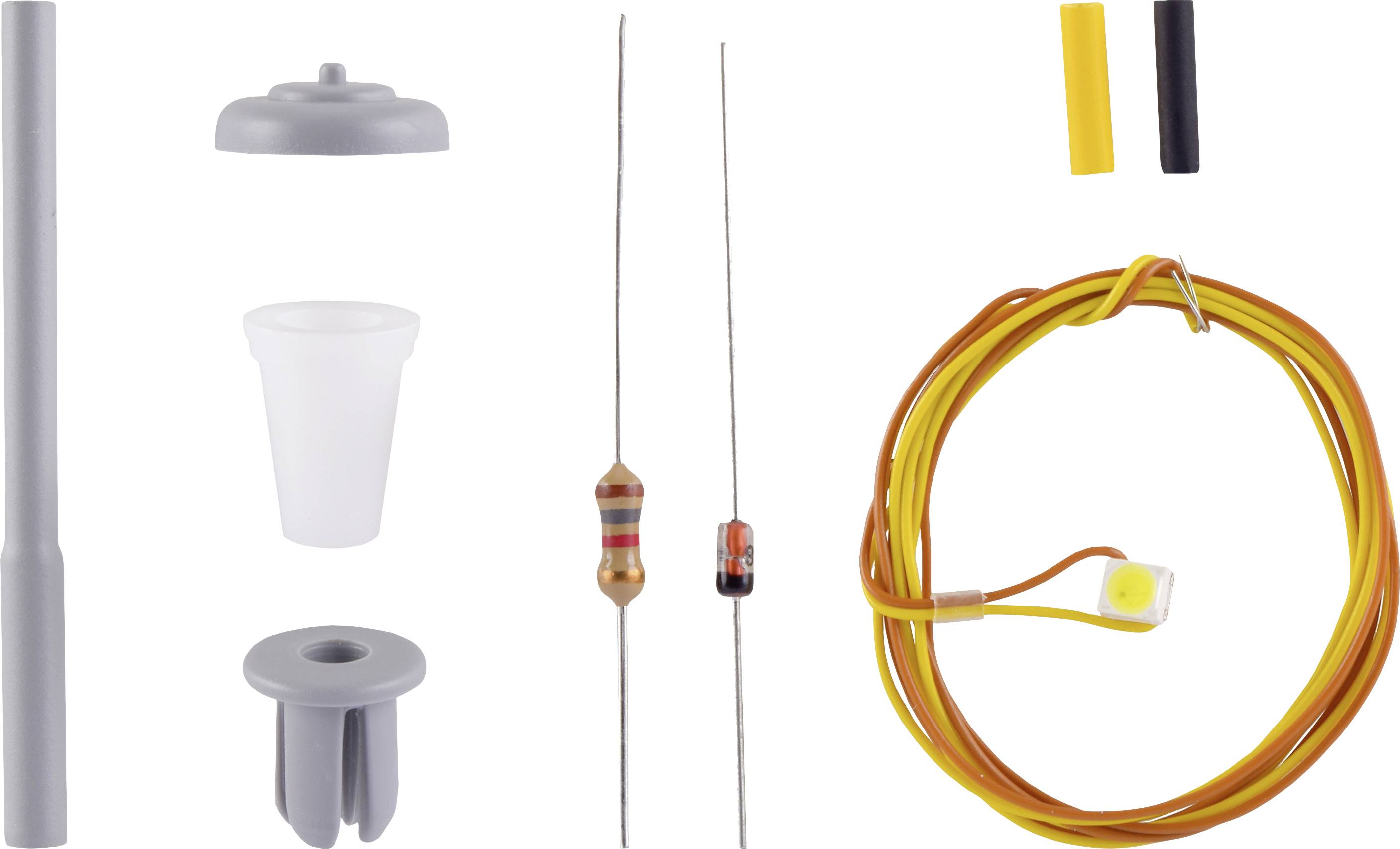 Various electronic components: a resistor, a ferrite core, a wire, a plastic capacitor, a wire with an attached plug.