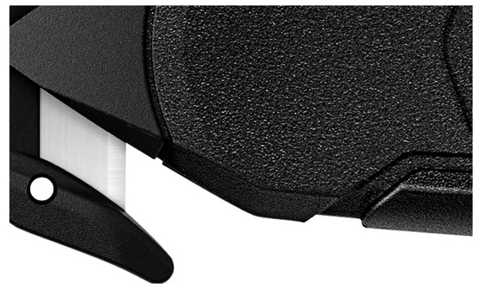 Close-up of a black safety knife with a partially extended blade mechanism, shown from the side.