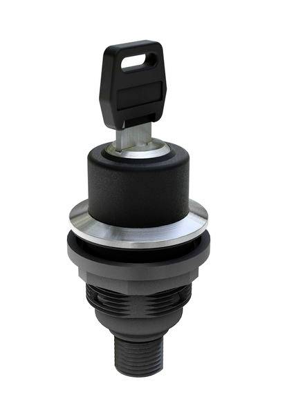 A black, cylindrical key switch with the key inserted. The switch has a metal ring around the top.