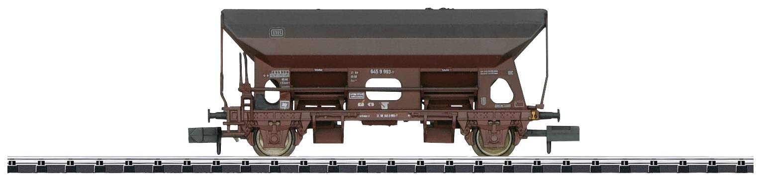 A brown goods wagon on rails, side view. The wagon has a trapezoidal loading capacity and is suitable for bulk materials.
