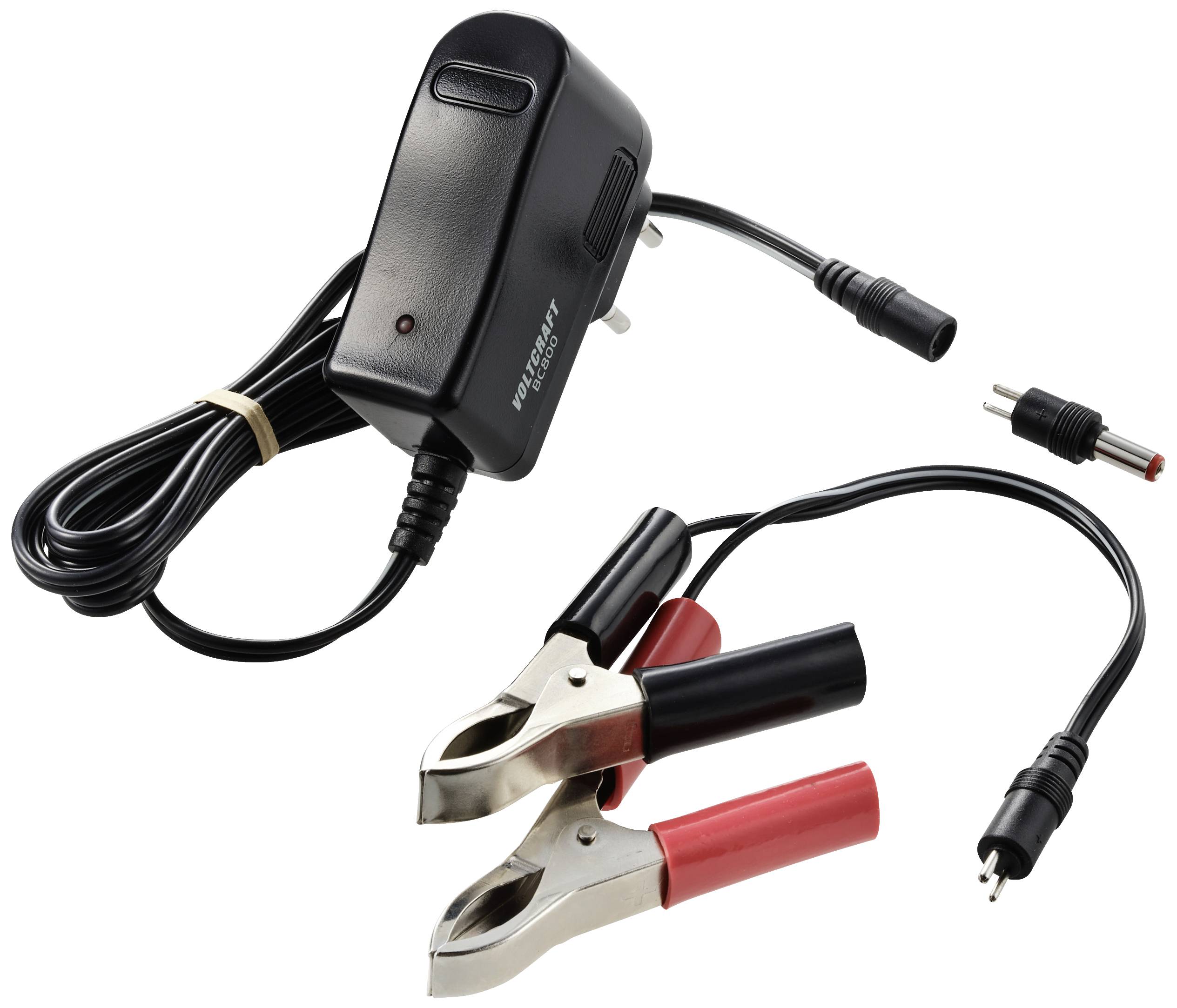 A battery charger with a mains cable and two crocodile clips, one red and one black, for connecting to battery terminals.