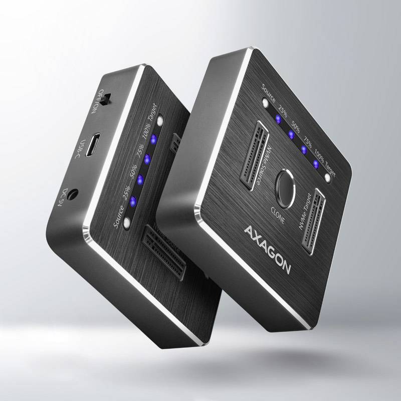 Two black electronic devices copying data. Label reads 'AXAGON'. Each device has a USB port and multiple slots visible.