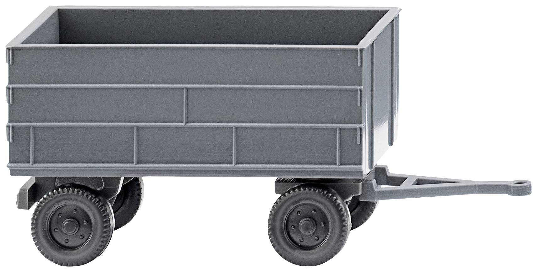 Grey toy trailer with four wheels, rectangular body and drawbar.