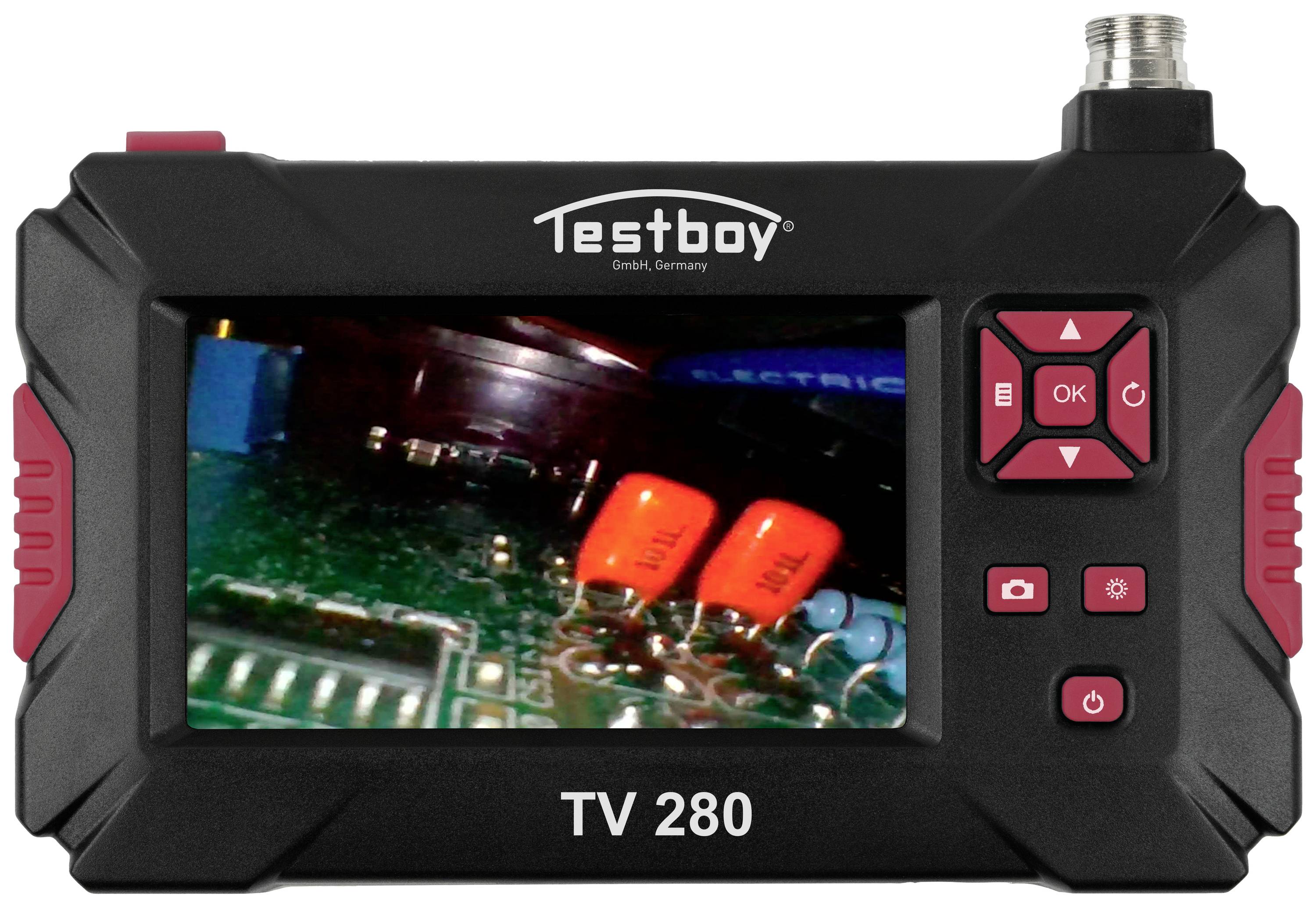 A portable testing device with a digital screen displaying a circuit board with electronic components. Brand name 'Testboy'.