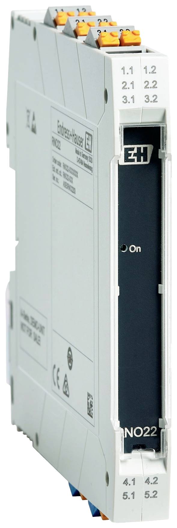 The image shows an electronic device with terminal blocks at the top and bottom, likely a signal converter or relay from Endress+Hauser.