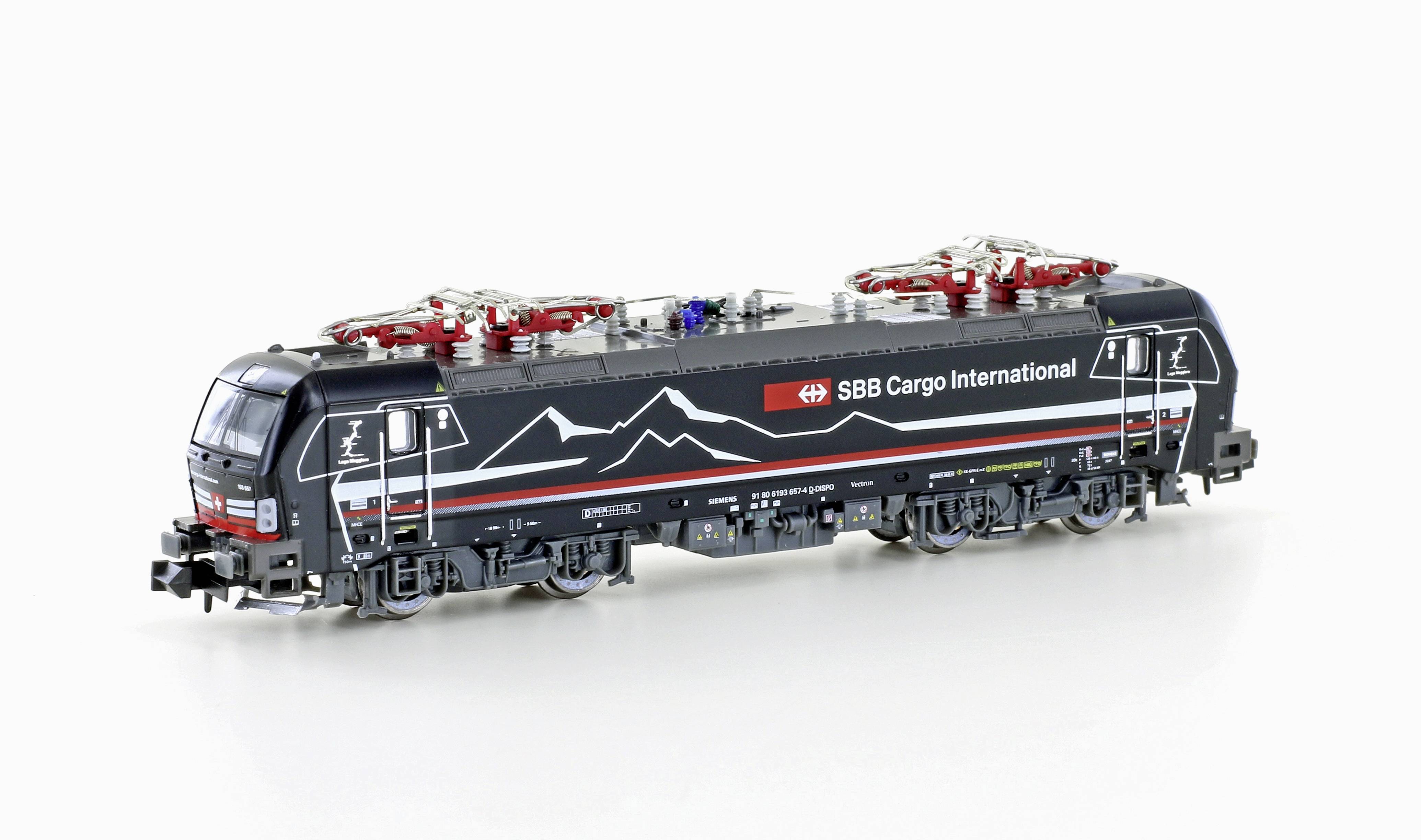 A black model locomotive with SBB Cargo International logo, mountain motif on the side, detailed view of wheels and pantographs, depicted on a white background.