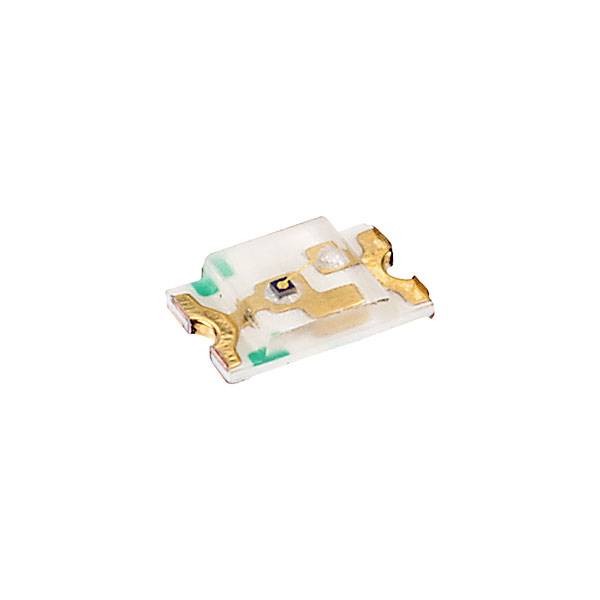 A tiny electronic component with gold-coloured connectors on a white board, possibly a microchip sensor.