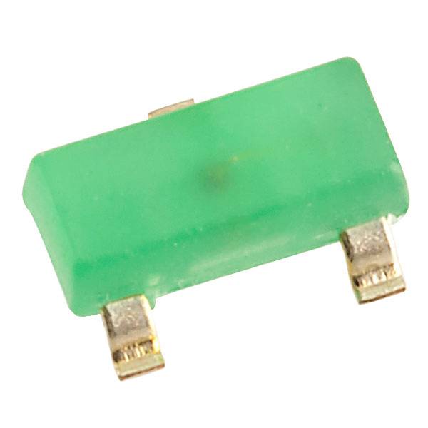 A green surface-mounted electronic component, likely a chip or resistor, with two metal connections on each side.