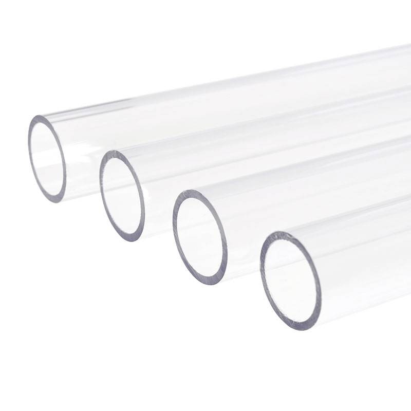 Four transparent plastic tubes lie side by side on a white background.
