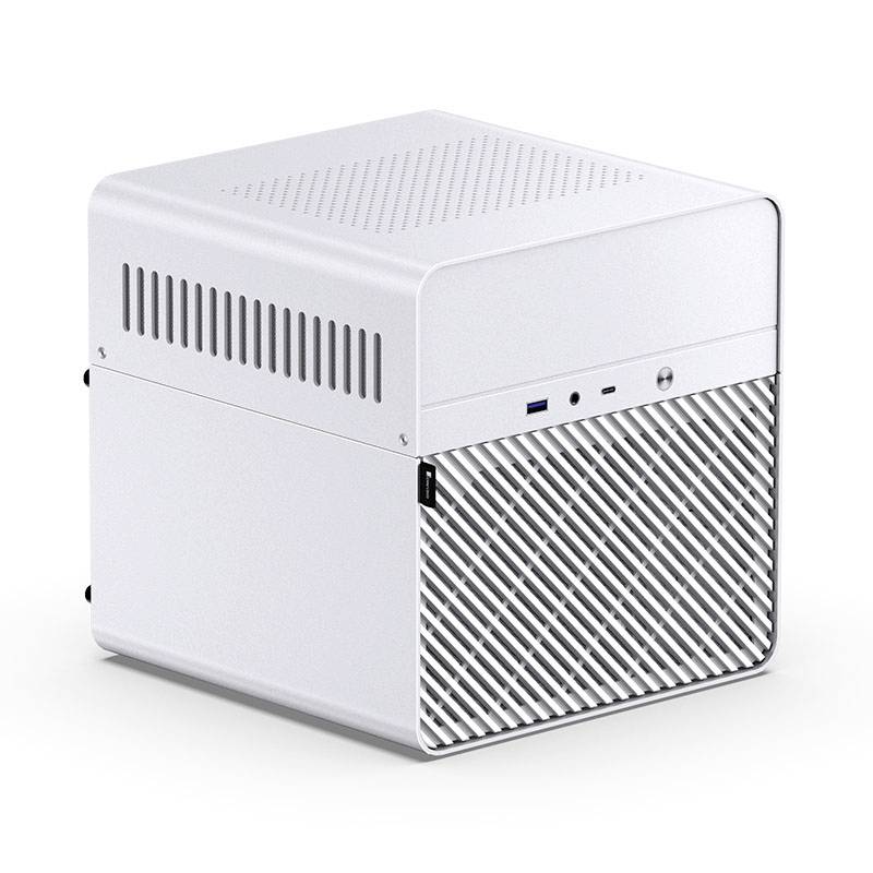 A silver, cube-shaped mini PC with ventilation slots and ports on the front.