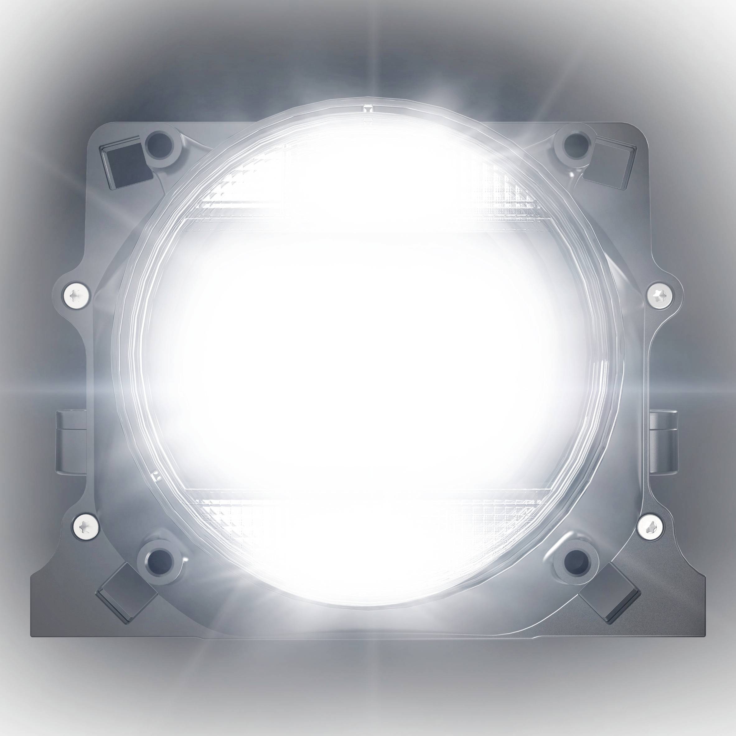 A brightly illuminating projector beam shining straight ahead. The light is intense and dominant in the centre of the image.