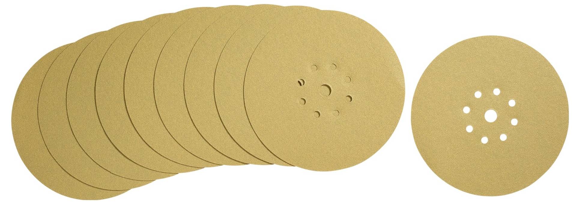 Beige grinding discs with holes in the centre, stacked.