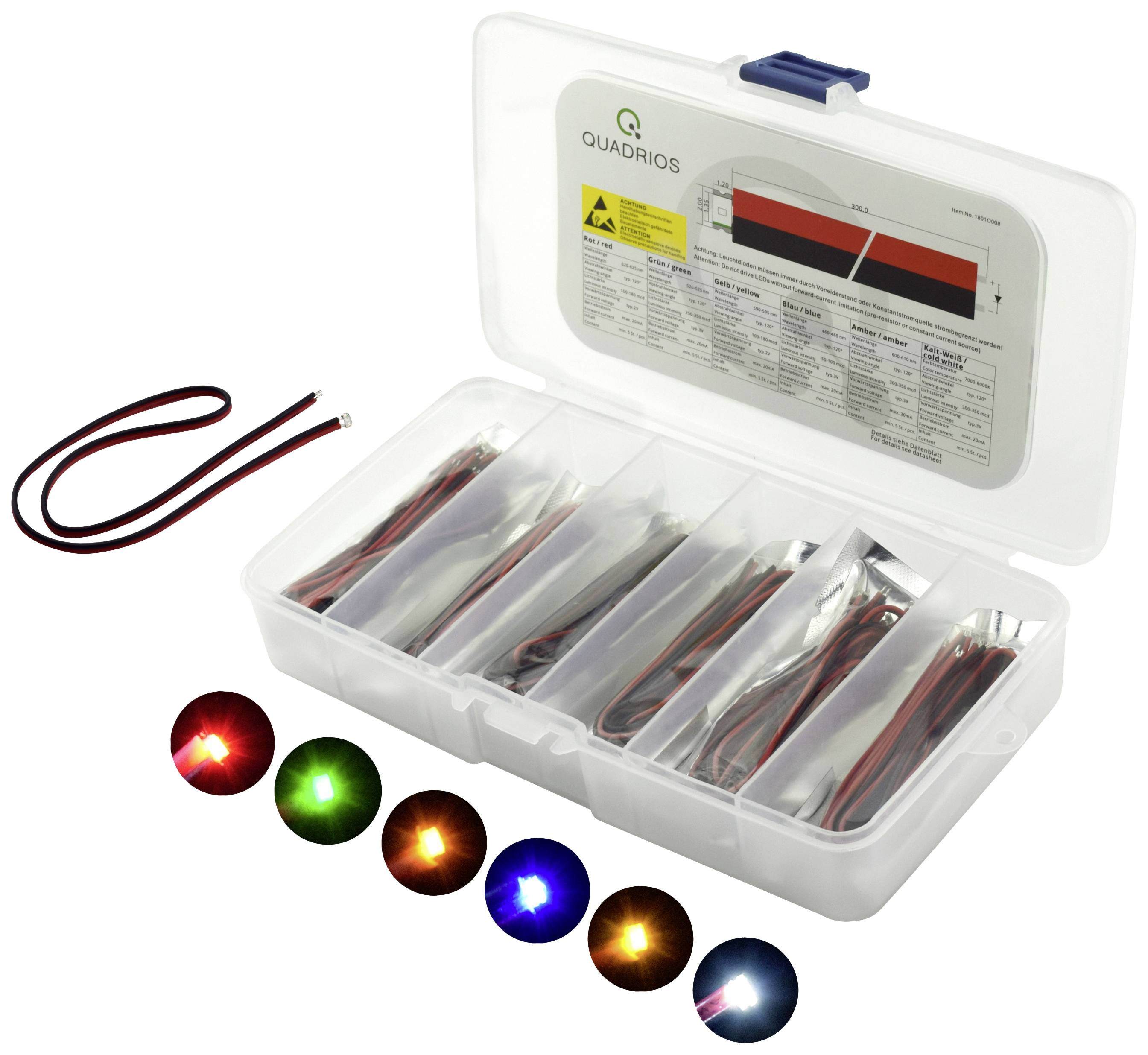 Plastic box with various coloured LEDs and wires, product information on the lid.