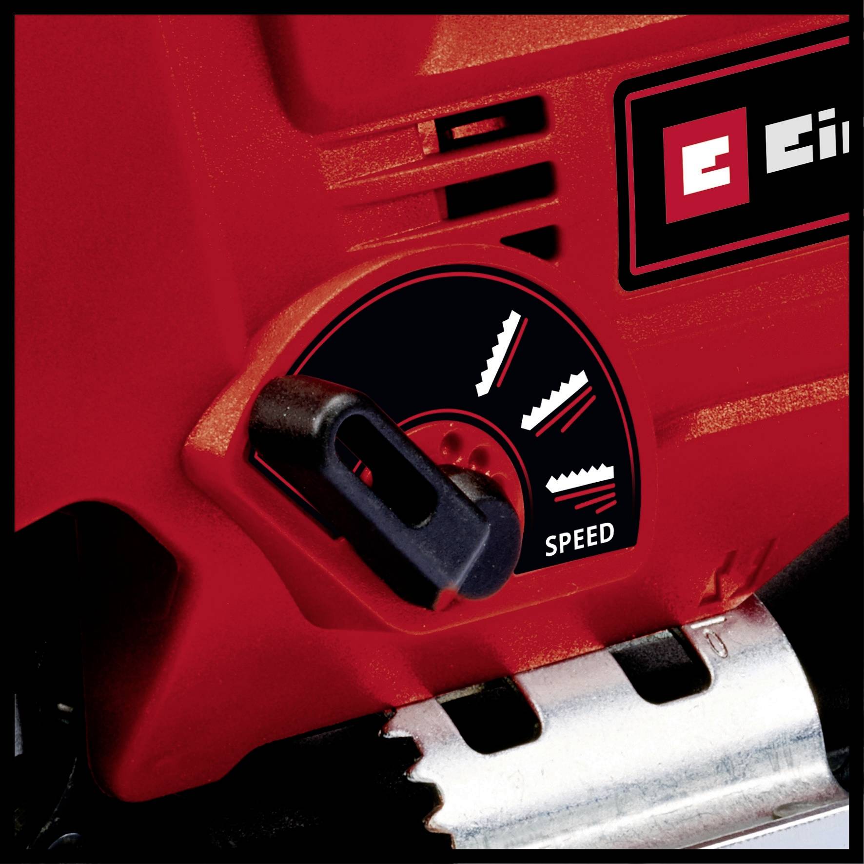A red electric power tool with a speed selector switch. The switch indicates three speed levels.