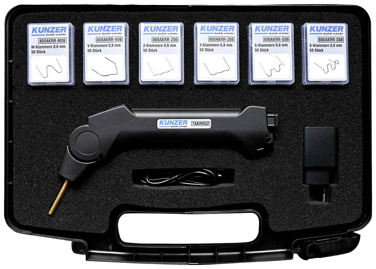 Tool case with electric cutting device and six boxes with various cutting shapes, brand Kunzer.<br><br>Translation:<br>Tool kit with electric cutting tool and six boxes with different cutting profiles, Kunzer brand.