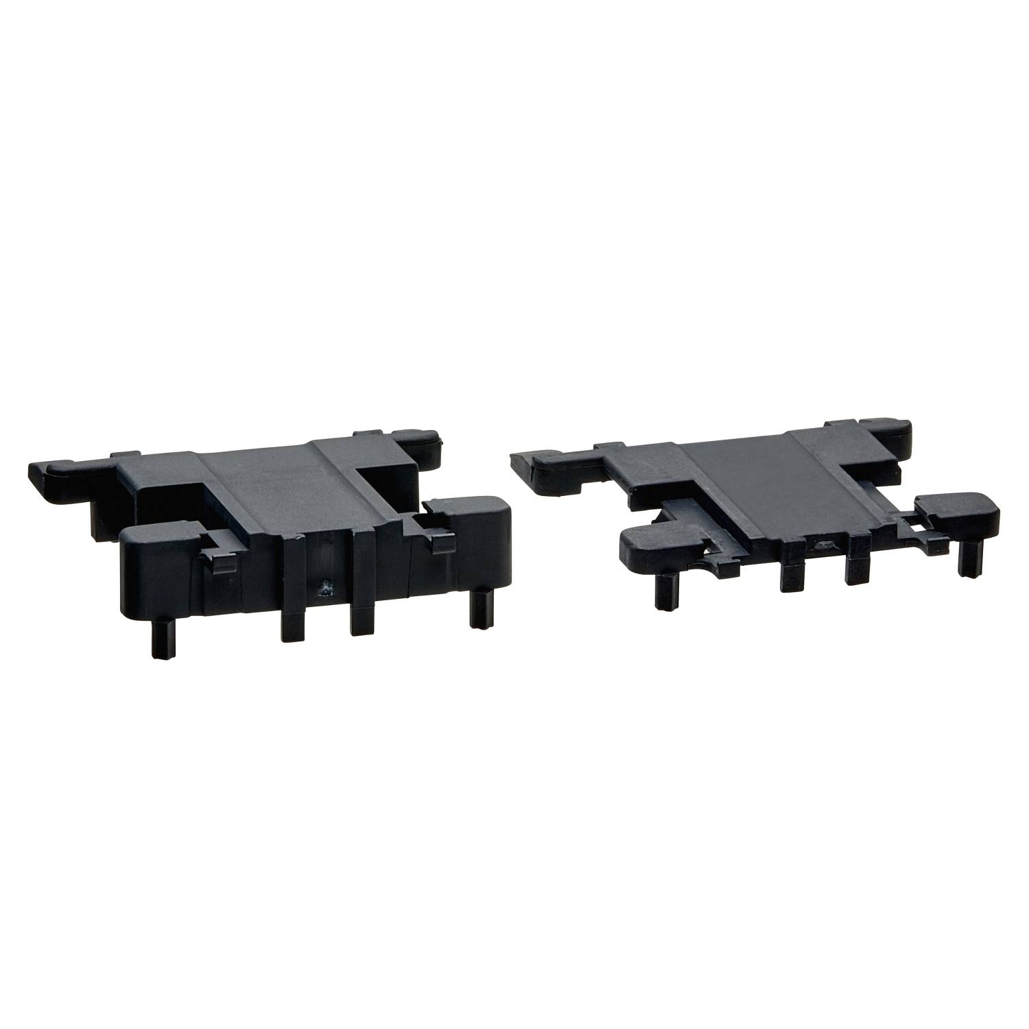 Two black plastic mounting brackets, lying side by side on a white background. They have multiple fixing points and various openings.