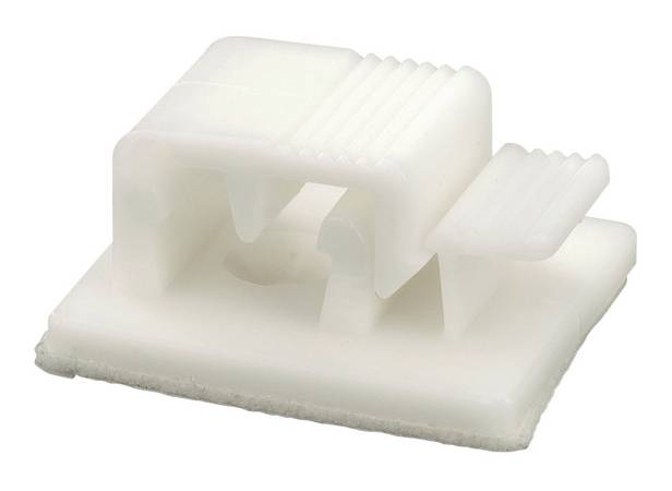 A white plastic holder with a rectangular base and raised platform. Used for securing labels.