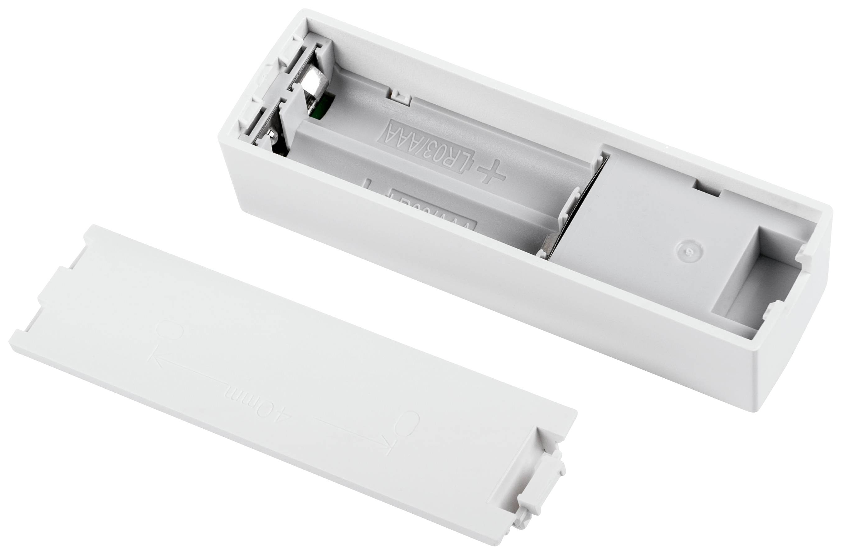 Open battery compartment with lid removed, showing the space for AA batteries.