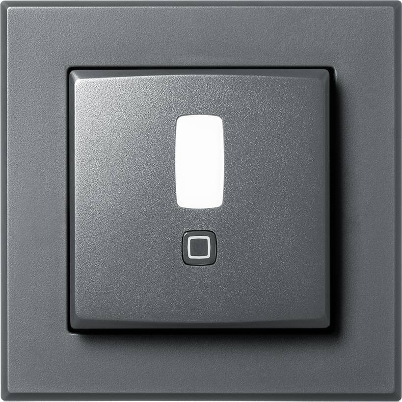 A grey light switch on the wall, in the 'off' position.