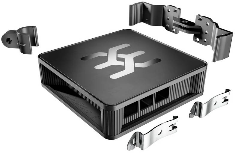 A black, square device with ventilation slots and a logo on the top surface. Mounting materials are arranged beside it.