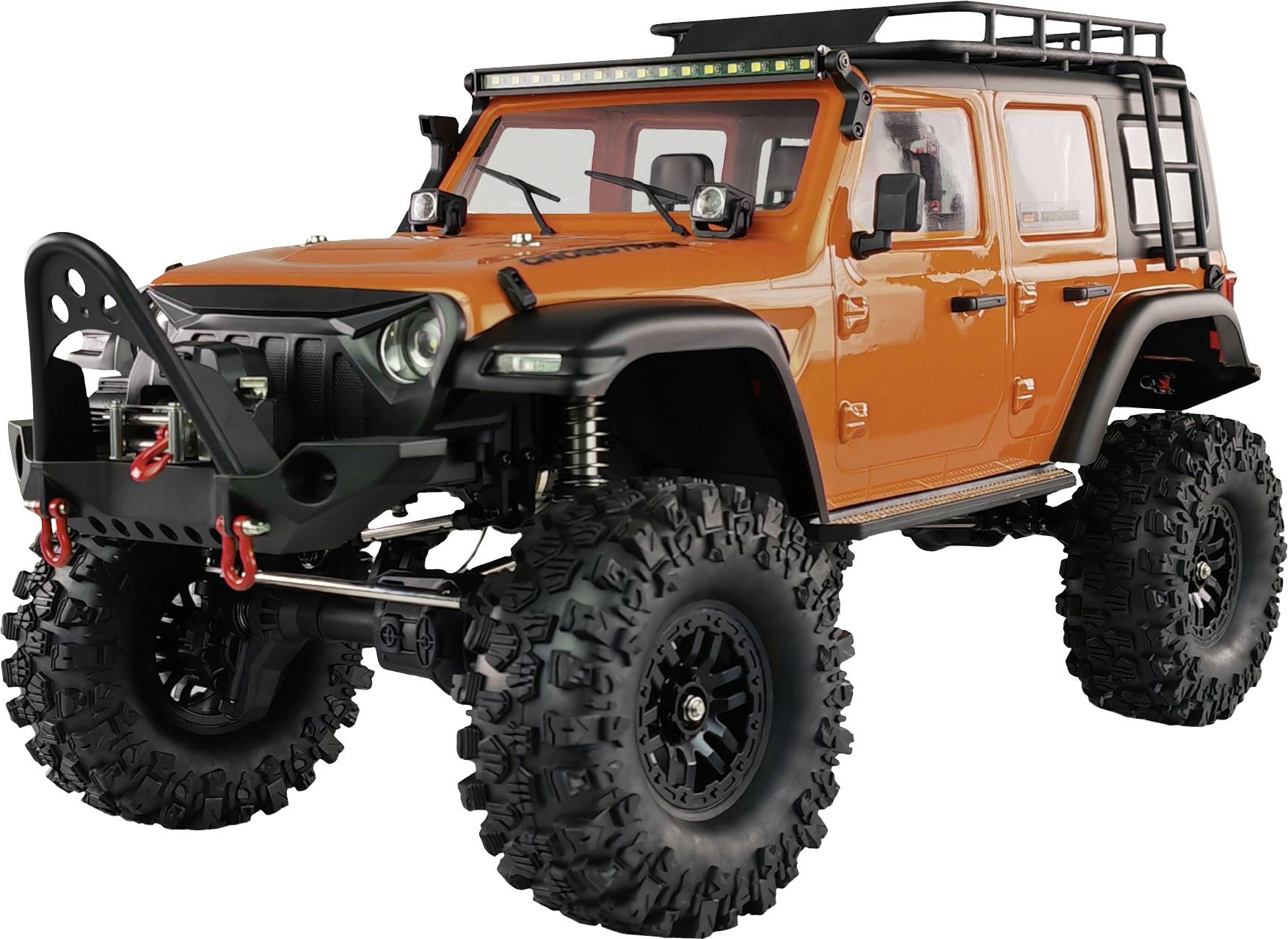 An orange-coloured, modified off-road vehicle with large, treaded tyres, used for off-road adventures.