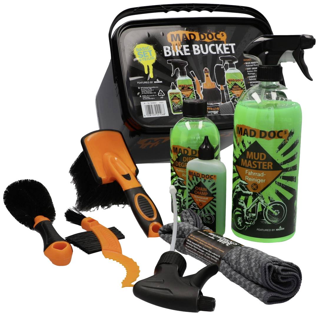 Cleaning kit with bucket, brushes, spray bottles and accessories for bicycle maintenance. Brand name 'Maddoc' on the cleaning products.