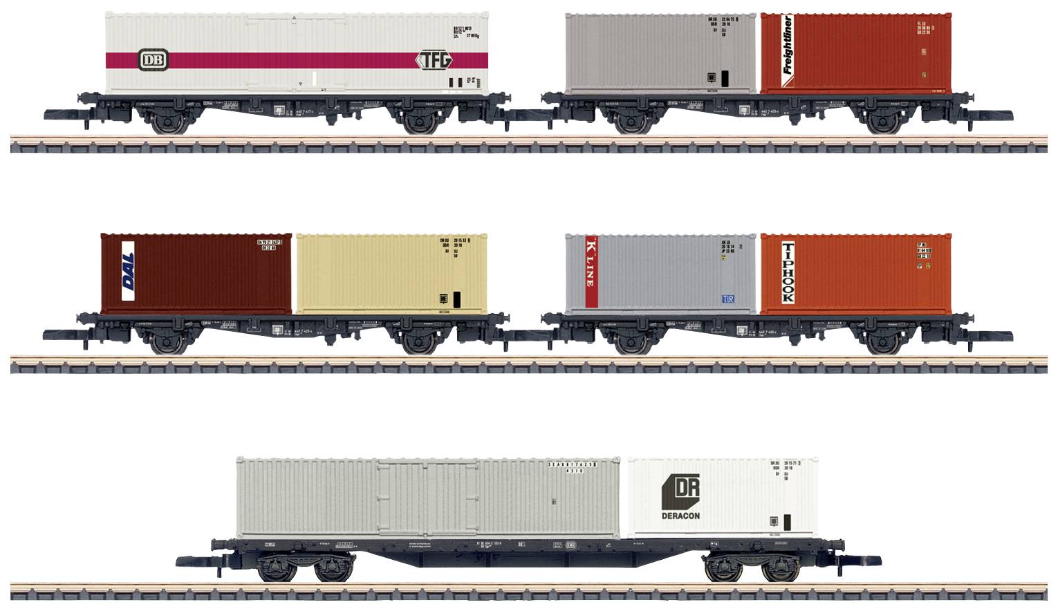Three model railway goods wagons with various container prints on tracks, including TLC, TRANSWAGGON and DR Traction.
