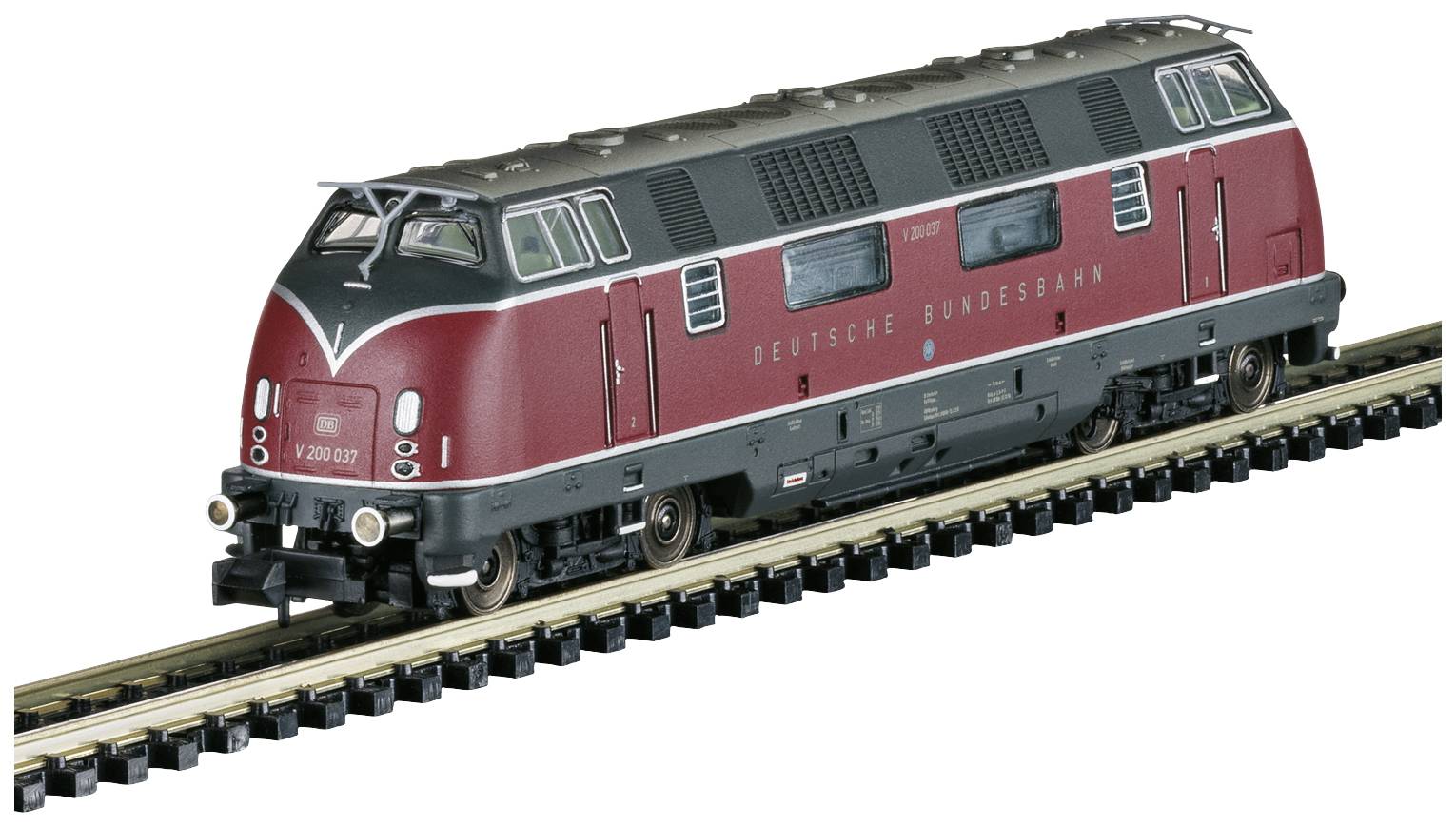 A model train of the Deutsche Bundesbahn, Class V 200, in red and black livery on a railway track.