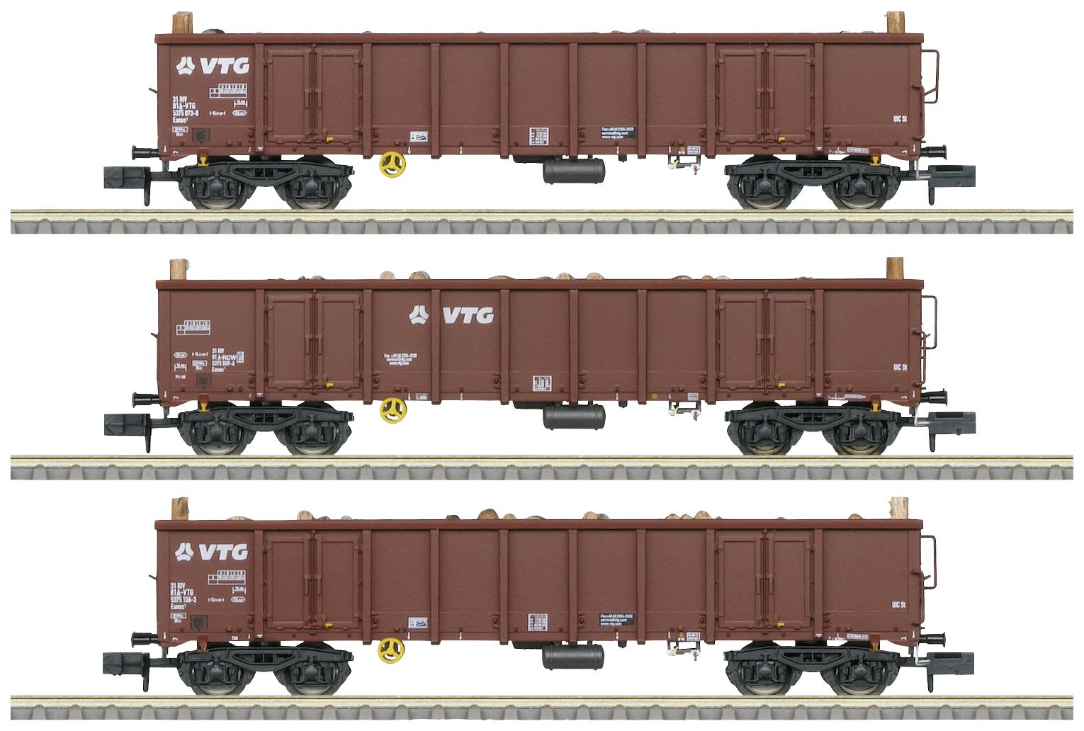 Three brown freight wagons of the VTG brand on railway tracks. Side view with attached brakes and markings.