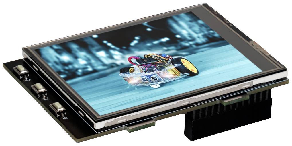 A small, remote-controlled car is racing quickly on a racetrack. It is displayed on the screen of an electronic device.