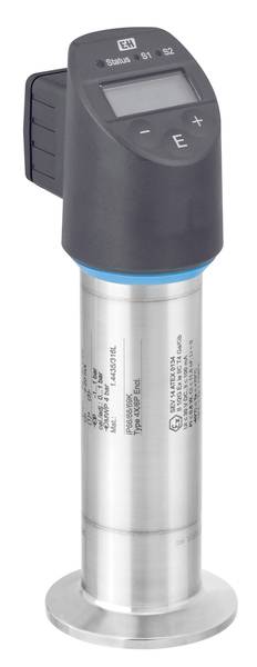 Industrial sensor in cylindrical form with digital display and control elements, mounted on a stainless steel surface.