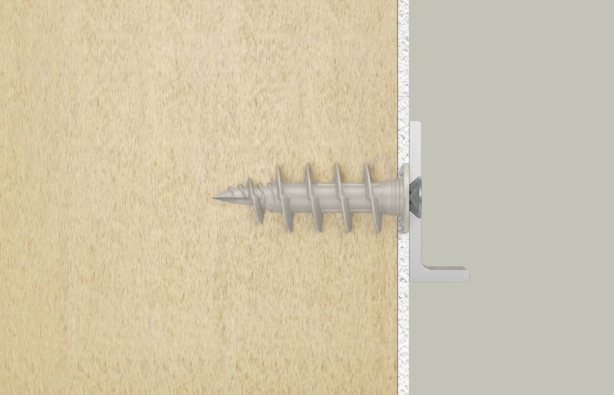 A plastic wall plug is secured in a wooden wall to provide support for a metal bracket. The bracket is fixed to the wall plug with a screw.