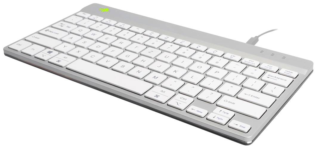 A flat, silver computer keyboard with white keys and a wired connection, photographed at an oblique angle from above.