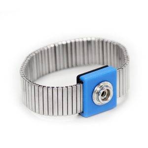 A silver elastic bracelet with a blue plastic casing and a metal screw in the centre, on a white background.