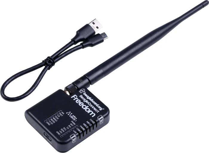 A black USB Wi-Fi module with antenna and cable, suitable for wireless internet connections.