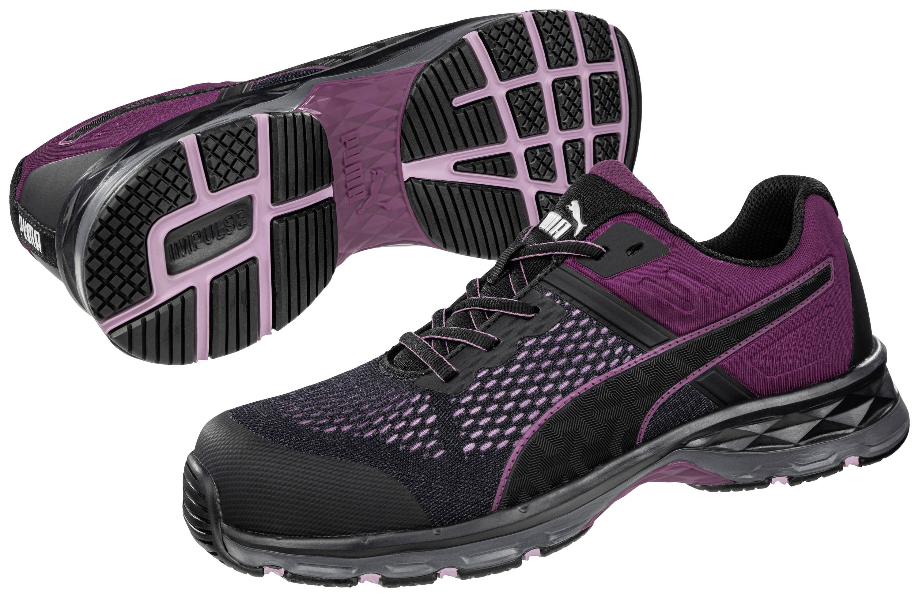 Black and red sports trainers with a mesh upper and hard-wearing rubber sole. Suitable for outdoor activities.