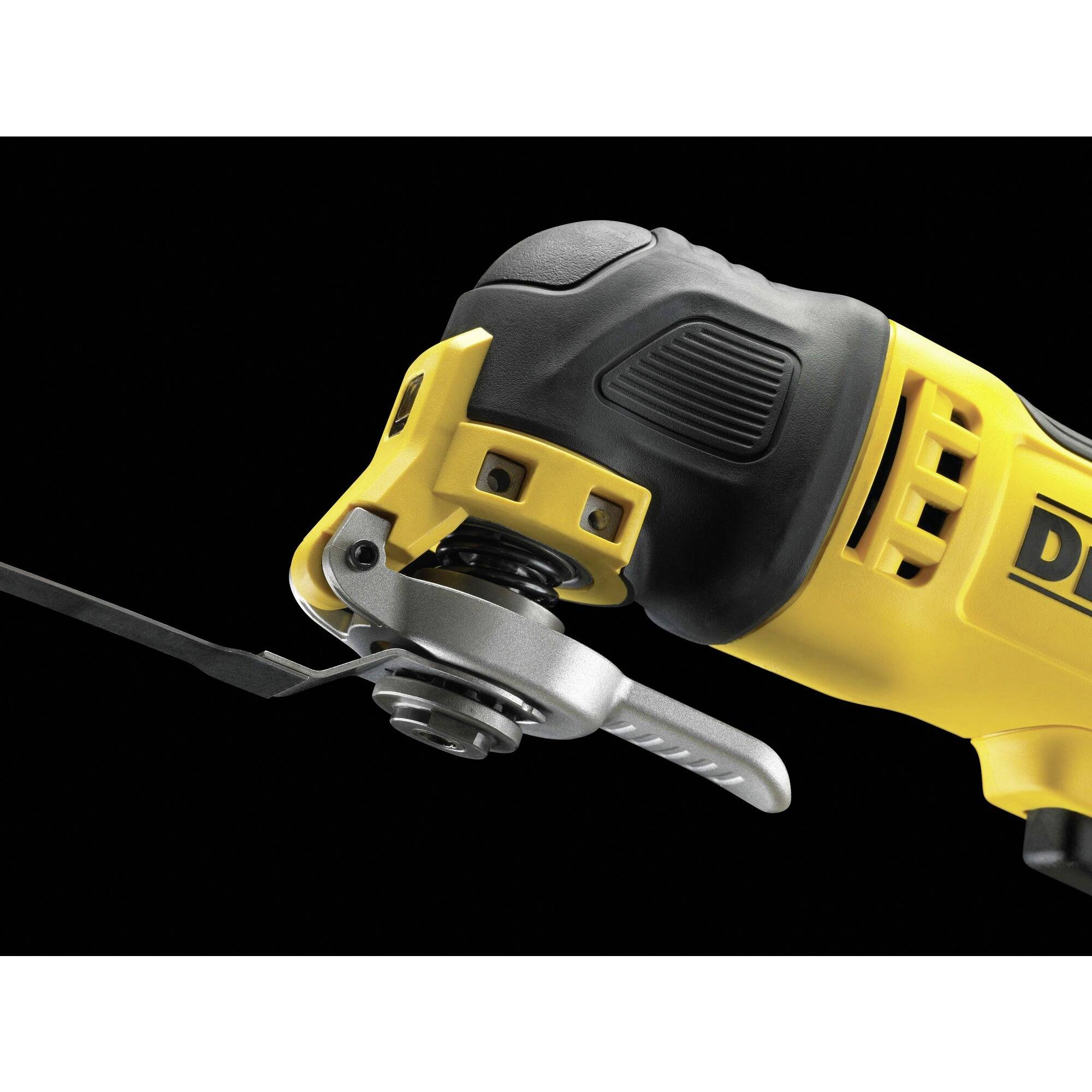 A yellow multi-tool with a black handle and attached blade against a black background.