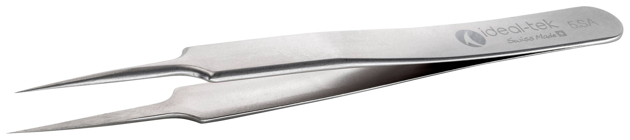 A metallic pair of tweezers with pointed tips lies sideways. The inscription 'idea-tak swiss Made' is visible on the tweezers.