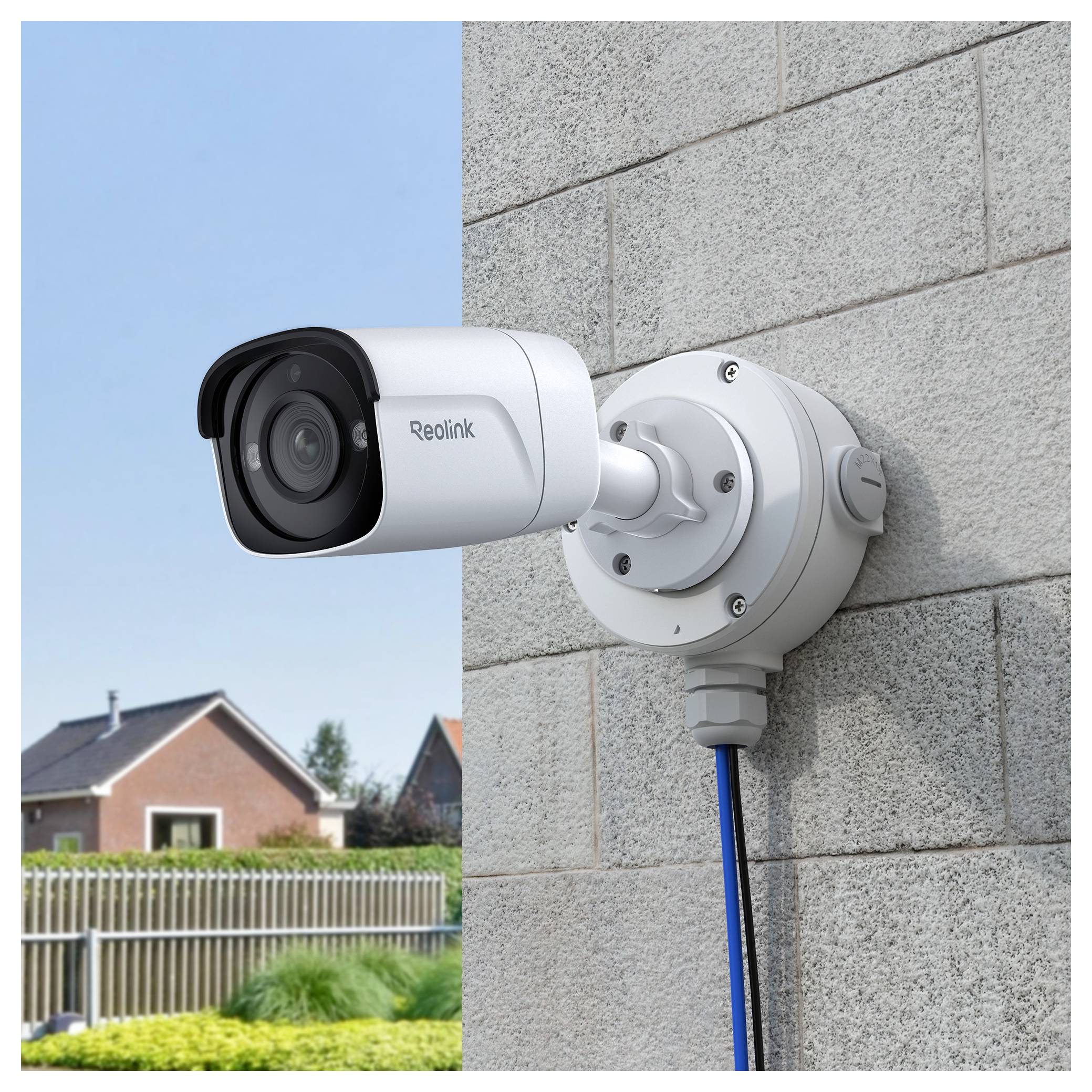 A security camera mounted on an exterior brick wall, overlooking a suburban street with houses and blue sky in the background.